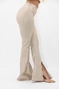 Pantalon pattes d'éléphant fendu aux chevilles en simili cuir